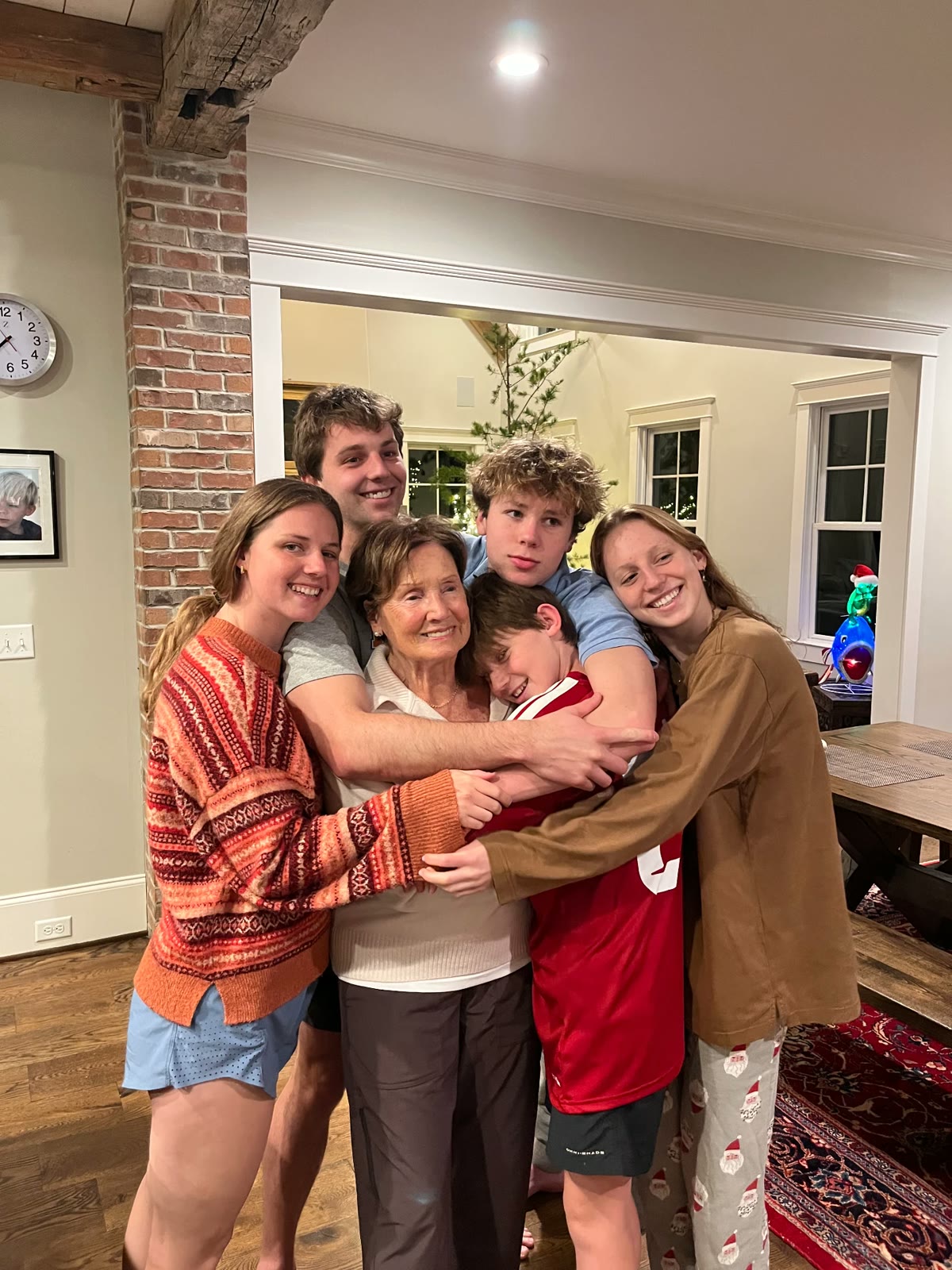 Nils Bognar with his siblings and grandmother at home
